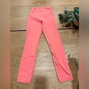 Lululemon peach colored leggings. Size 0, short.